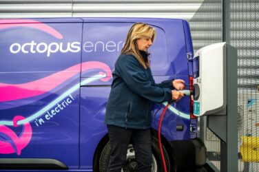 Octopus Energy team member using EV charger